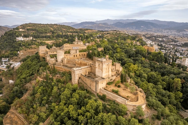 Alhambra, Spain: A Majestic Moorish Palace in Andalusia, Renowned for Its Stunning Architecture, Lush Gardens, and Rich History