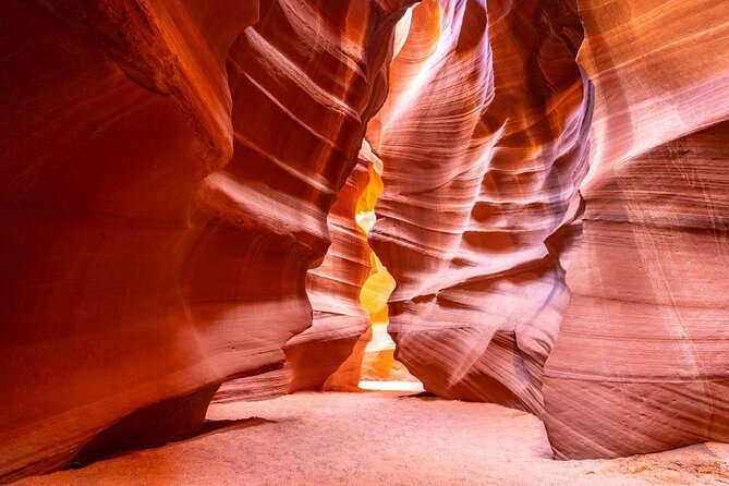 Antelope Canyon, USA: A Breathtaking Slot Canyon Known for Its Wavy Sandstone Walls and Mesmerizing Light Beams