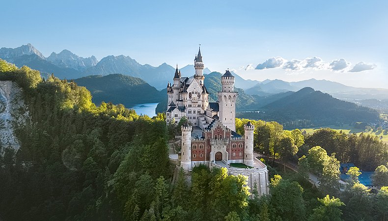 Neuschwanstein Castle: A Fairytale Fortress in Germany, Inspiring Disney’s Iconic Castle with Its Breathtaking Architecture and Scenic Alpine Setting